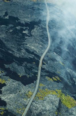 Road through lava field

