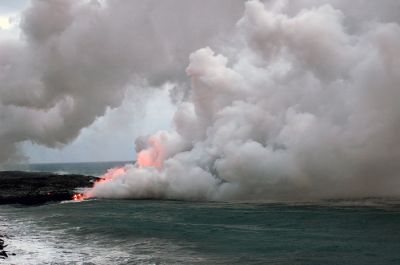 Lava meets ocean at dawn
